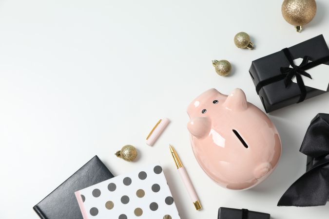 Concept of Christmas finance with piggy bank, space for text
