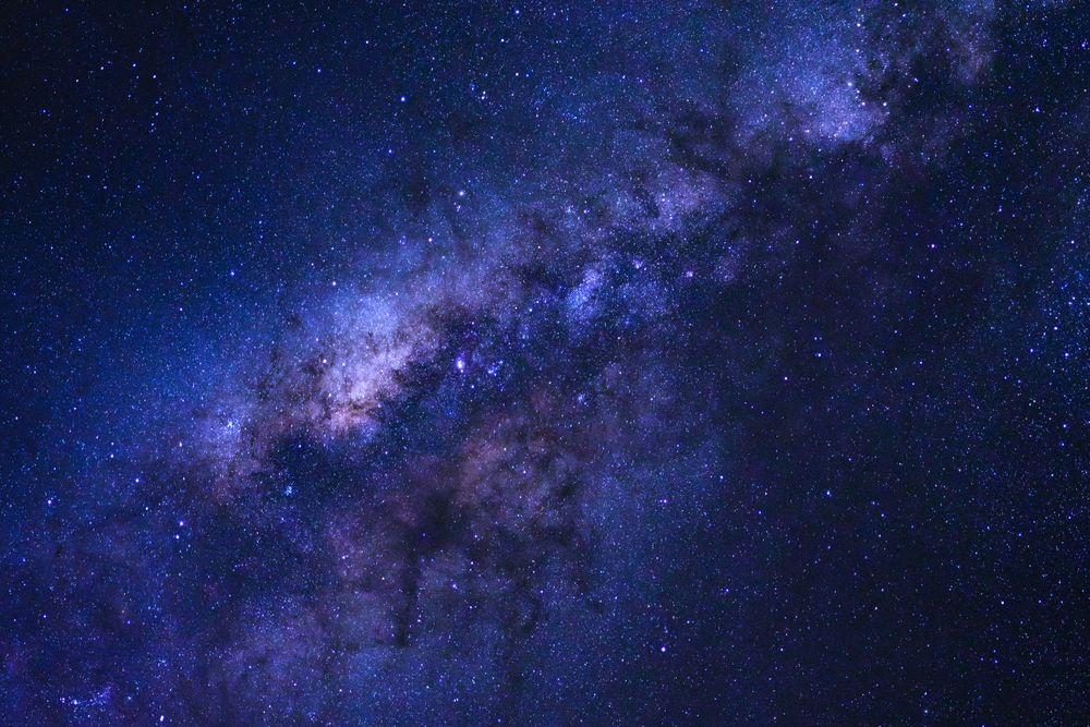 Starry night sky and milky way galaxy with stars and space dust in the universe