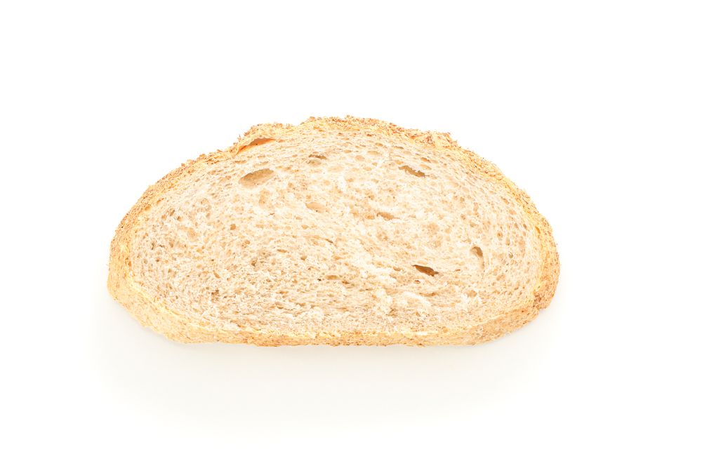 Wheat bread piece isolated on blank background. Bakery products