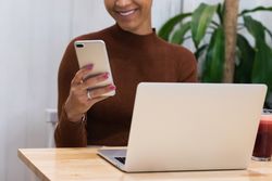 Anonymous content Black woman working in cafe