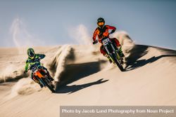 Intense motocross riding over sand dunes 5X6Dvb