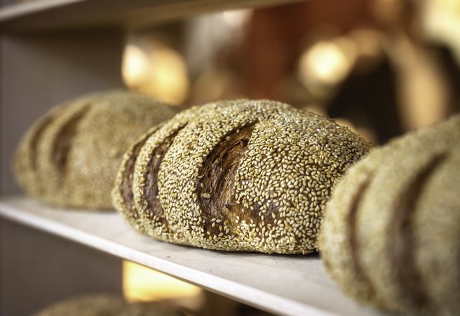 Sourdough bread with sesame seeds on a shelf