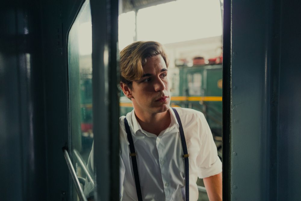 Traveler looking out train window