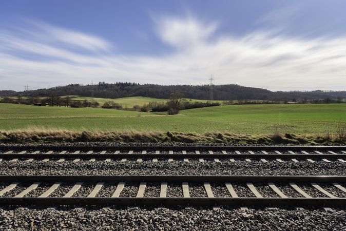 Railway tracks and sunny spring nature scenery