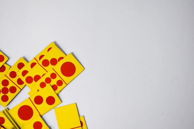 Top view of red and yellow domino cards
