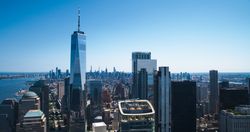 Scenic Aerial New York City View of Lower Manhattan Architecture. Panoramic Wall Street Financial District Shot from a Helicopter. Cityscape with Office Buildings and Skyscrapers