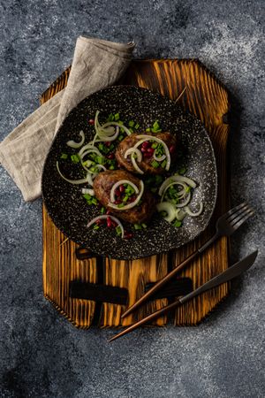 Top view of delicious plate of abkhazura cutlets on plate