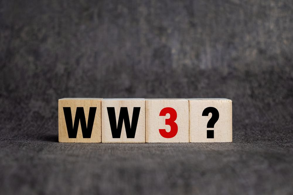 world war 3 with question mark on wooden blocks isolated on dark background