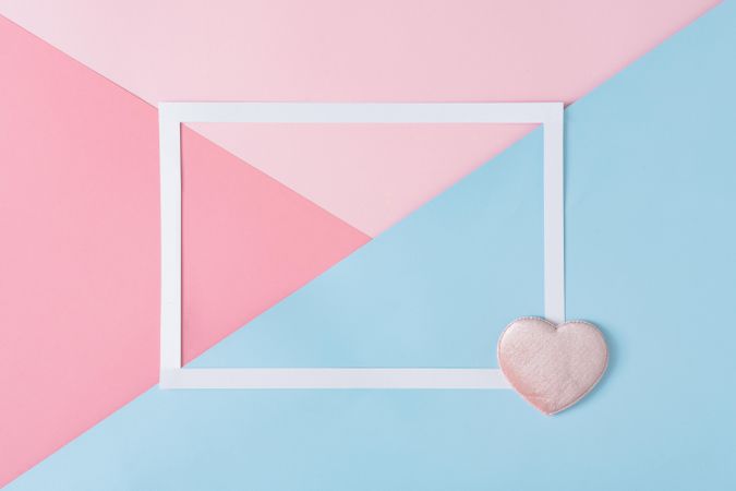 Blue and pink background with heart