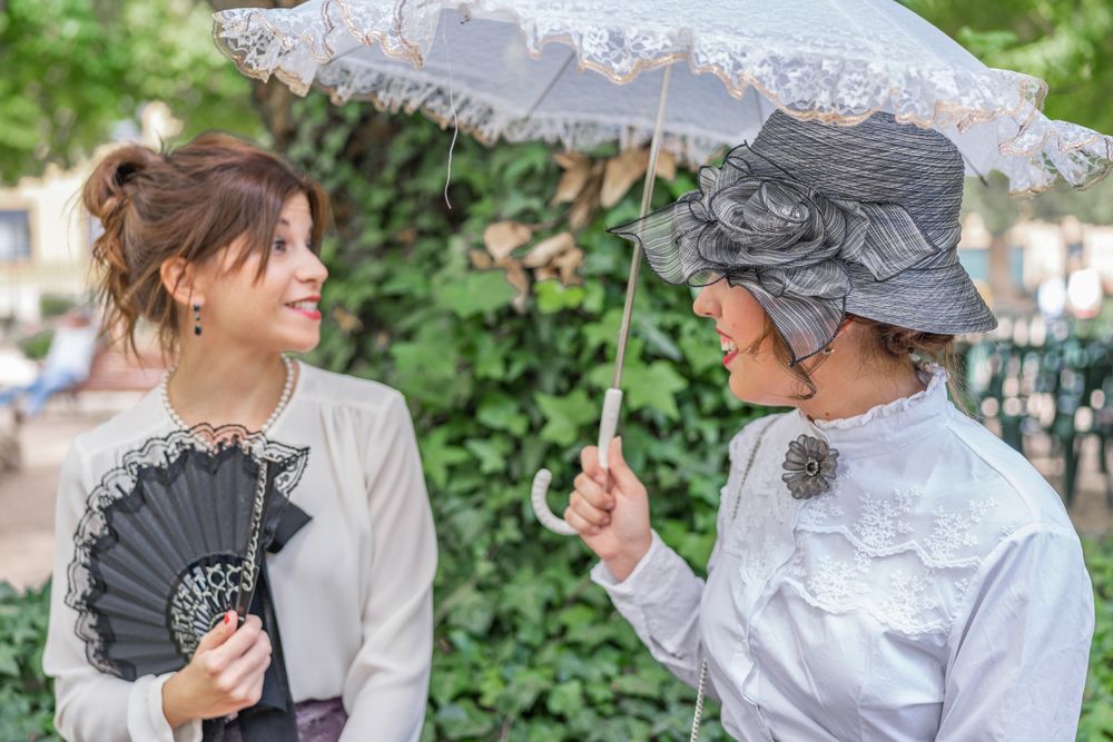Old fashioned women talking in park