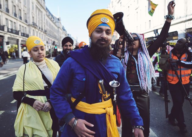 London, England, United Kingdom - March 19 2022: People in Sikh turbans at anti-racism rally