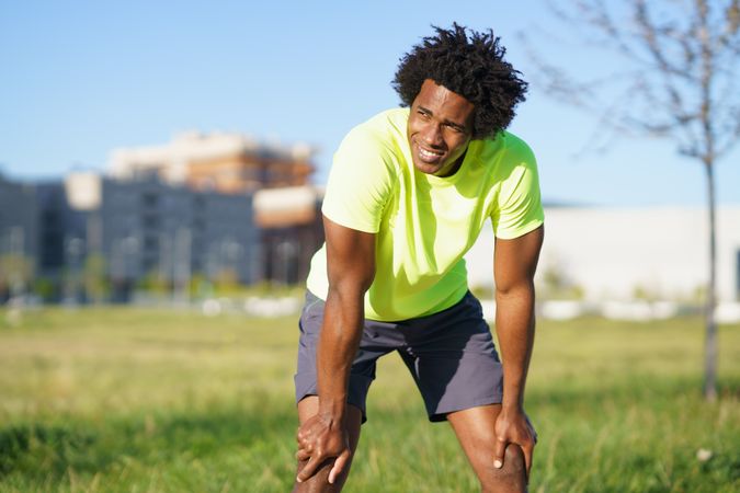 Man resting on sunny day after workout