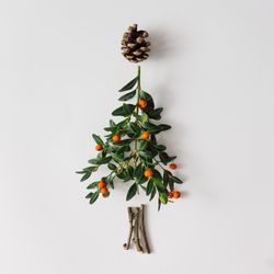Christmas tree made of leaves and berries