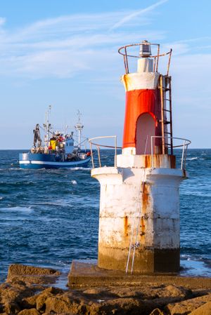 Lighthouse on rocky coastline