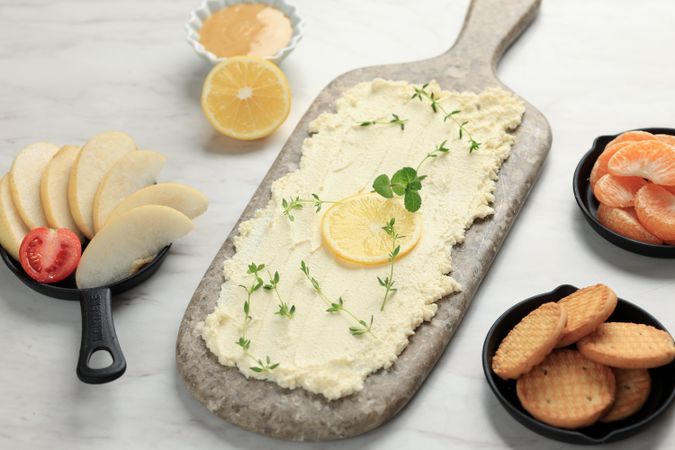 Butter Board with Fresh orange, Cookies, and Mini Croissant.