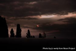 Red moon over atmospheric cloudy nightsky 4A8QY5