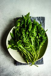 Arugula leaves on plate