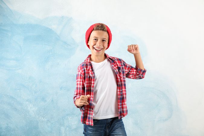 Fashion boy on color background, space for text