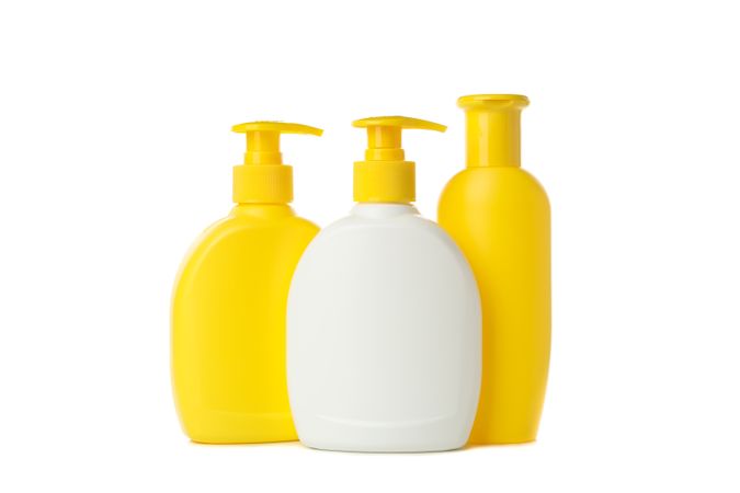 Blank bathroom bottles isolated on light background. Bathroom accessories