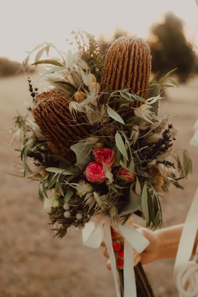 Woman in dress with flower bouquet