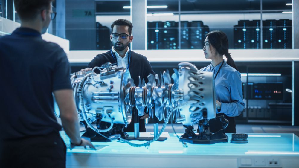 Thrust Engine Engineer, Project Manager and Machinery Operator Work on a Futuristic Turbine Motor