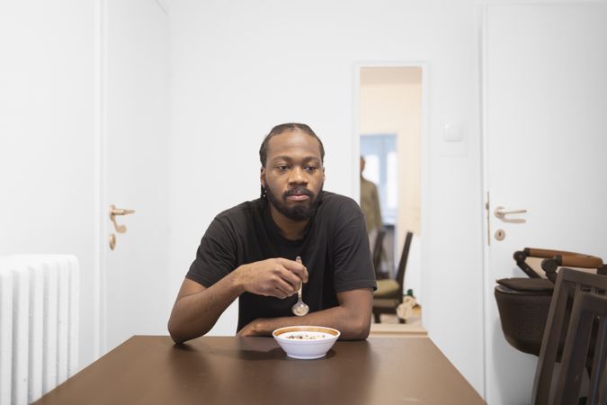 Domestic Scene: Man Eating Breakfast.