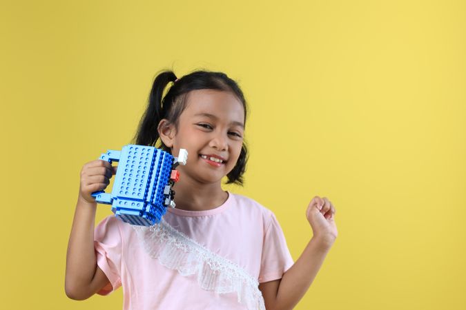 Asian Girl Kids Drink Water from Blue Cute Cup