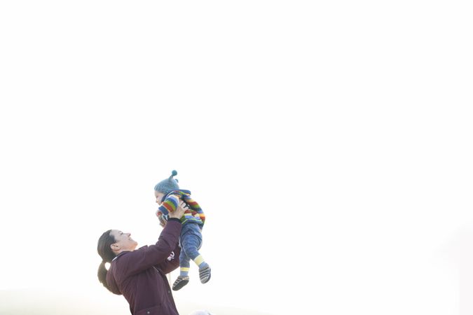 A mother and her child having fun together.