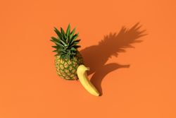 Summer fruits on an orange background
