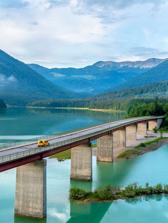 Lake Sylvenstein Bridge in an alpine scenery on a beautiful day of summer