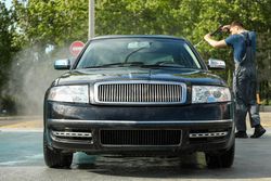 A man washes a car. Clear car concept