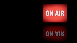 On air neon light banner with reflection copy space