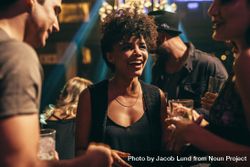 Shot of young woman enjoying nightclub with friends 4NmN85