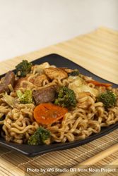 Yakisoba noodles. Yakisoba dish with meat, chicken and vegetables. 0JGQGn