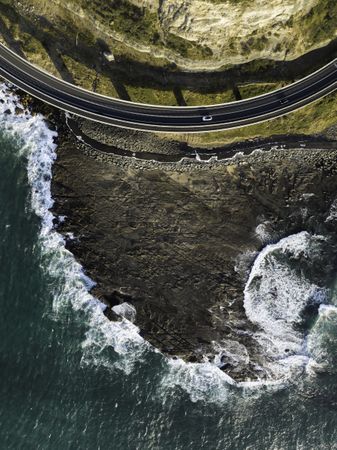 Aerial view of ocean by road
