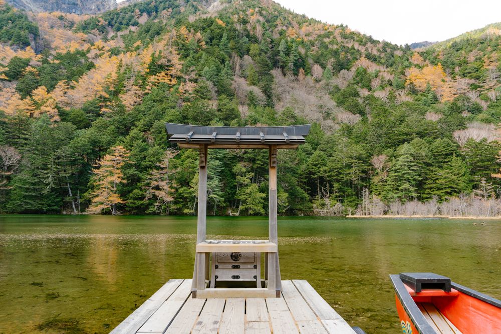 Myojin Pond with Hotaka Shrine in Kamikochi in Autumn, Japanese Alps, Chubu Sangaku National Park