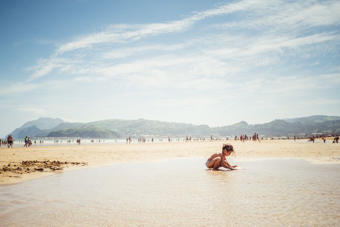 little girl by the seashore