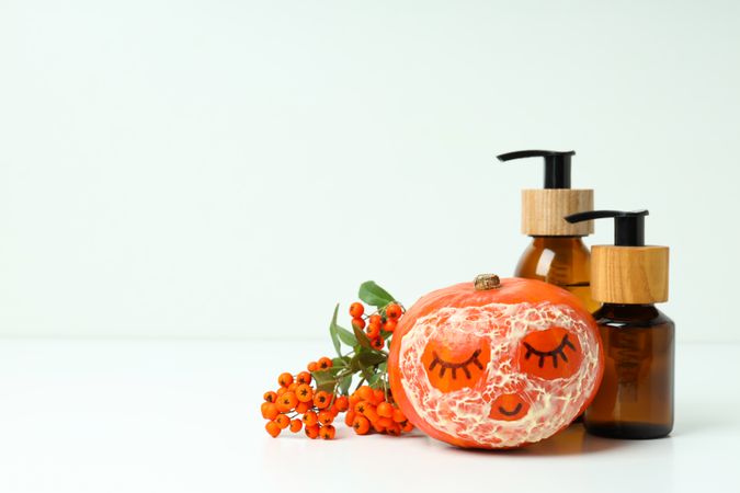 Concept of different cosmetic products, Pumpkin cosmetics, space for text