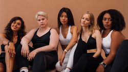 Multi-ethnic group of female friends in athletic gear