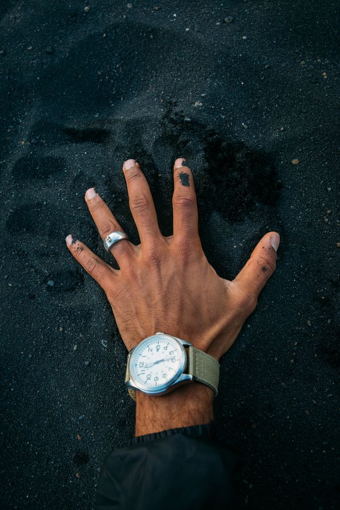 Crop hand touching soil