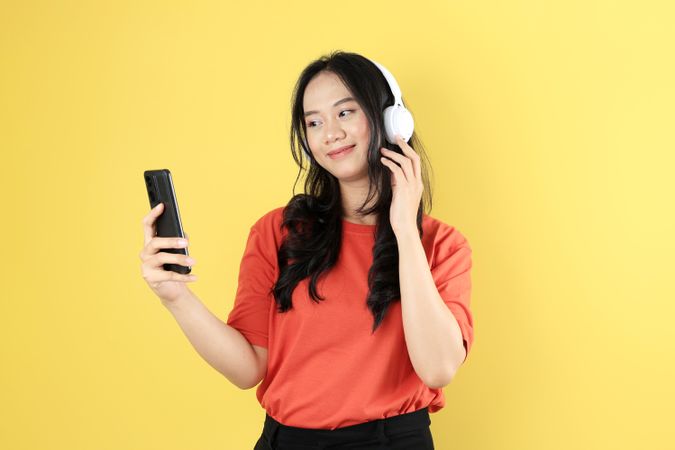 Asian Young Female Woman Wearing Headphone Smartphone Listen Music