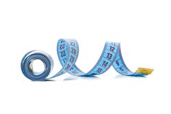 Measuring tape isolated on light background. Weight loss