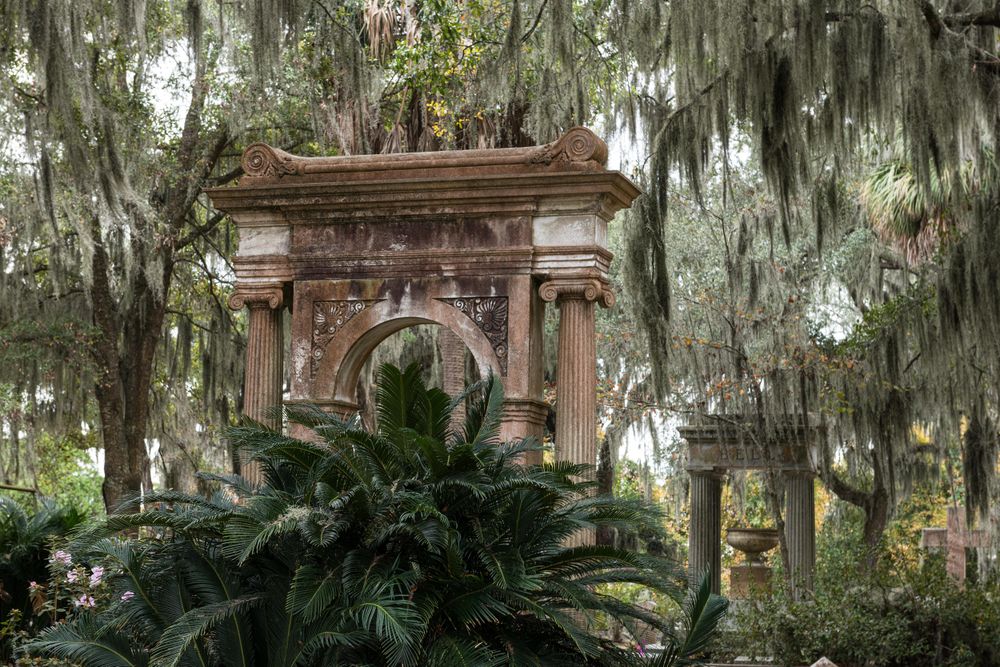 Spanish Moss drooping over Southern cemetery grave markers