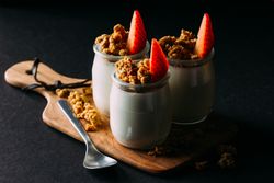 Glass bottles with milk and walnuts