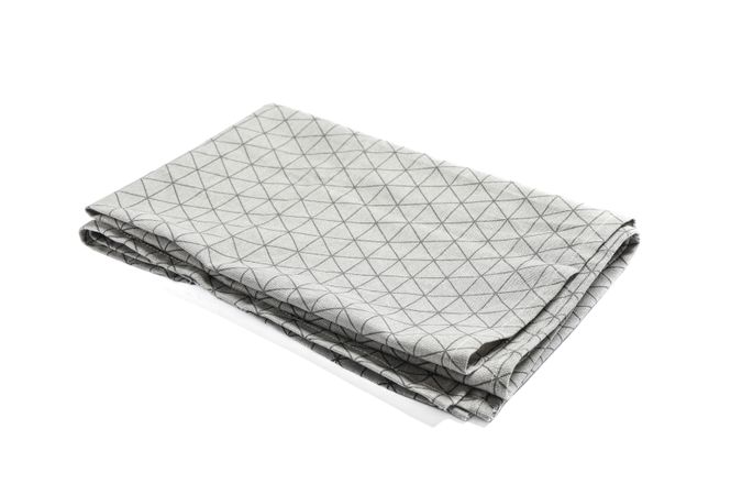 Folded grey napkin isolated on plain background