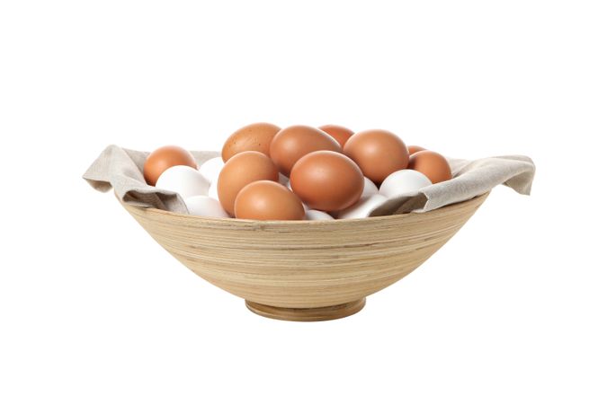 eggs in a deep dish, isolated on blank background.