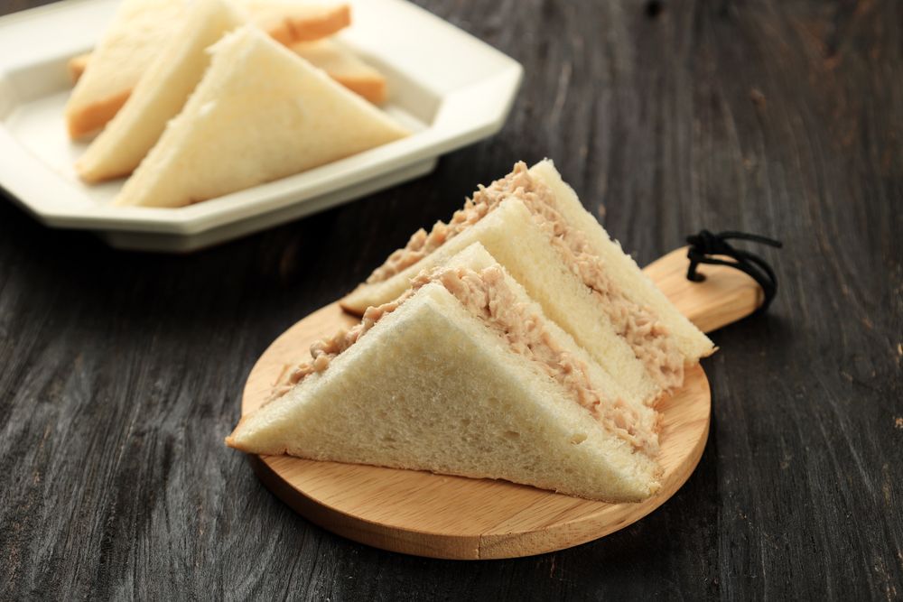 Tuna Mayo Sandwich on Wooden Table