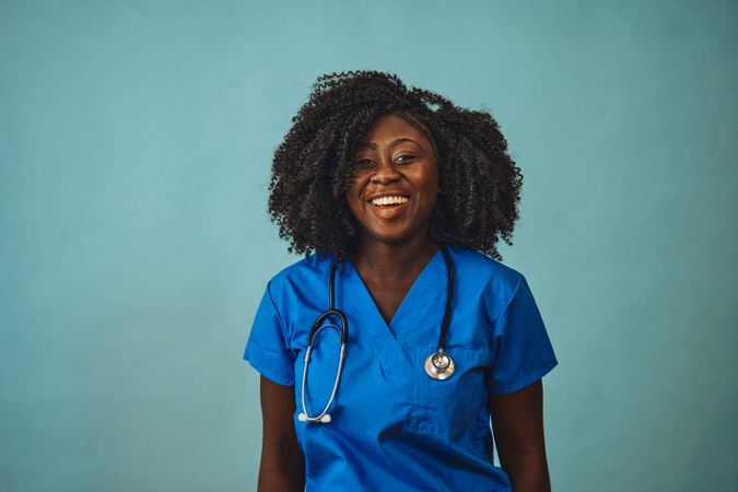 Woman doctor smiling with stethoscope