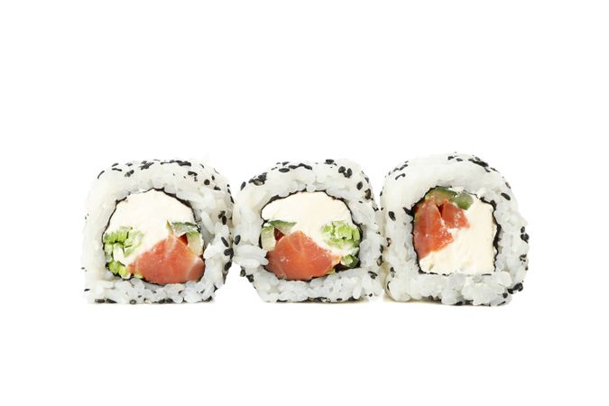 Japanese food. Delicious sushi rolls isolated on light background