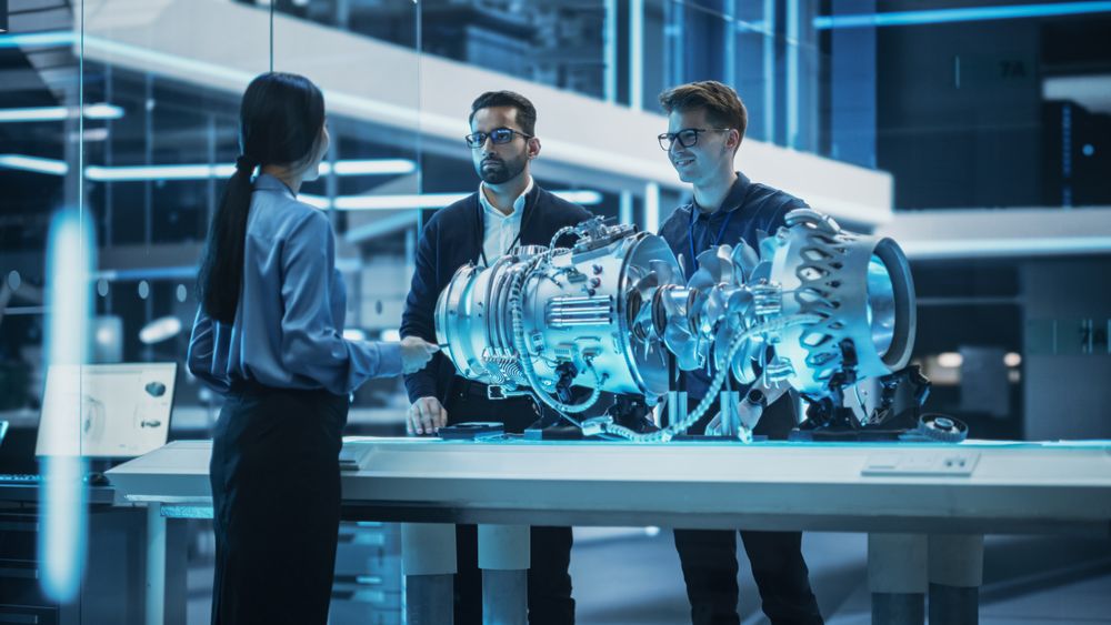 Smart Team of Engineers, Project Manager and Machinery Operators Collaborate on a New Type of a Electric Turbine Engine